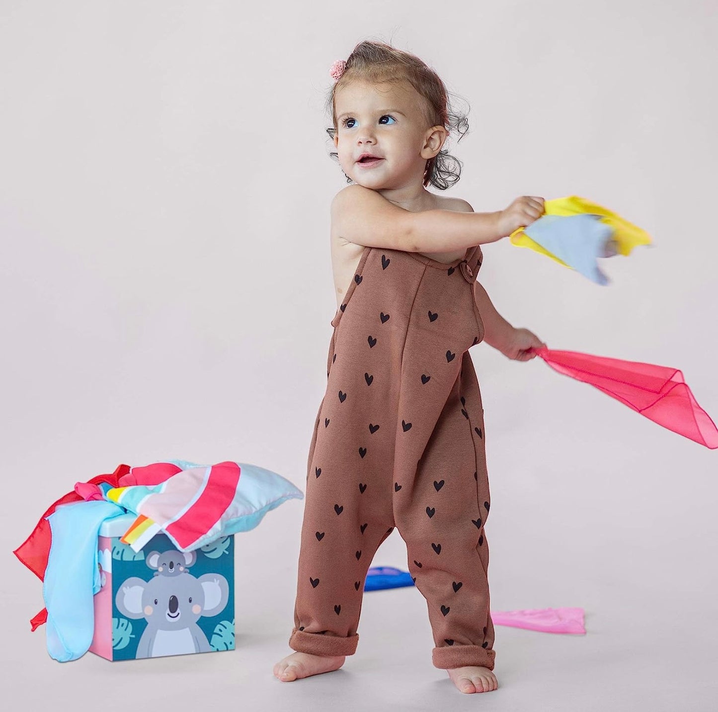 Taf Toys Sensory Crinkle Tissue Box for Toddler STEM and sensorial engagement.