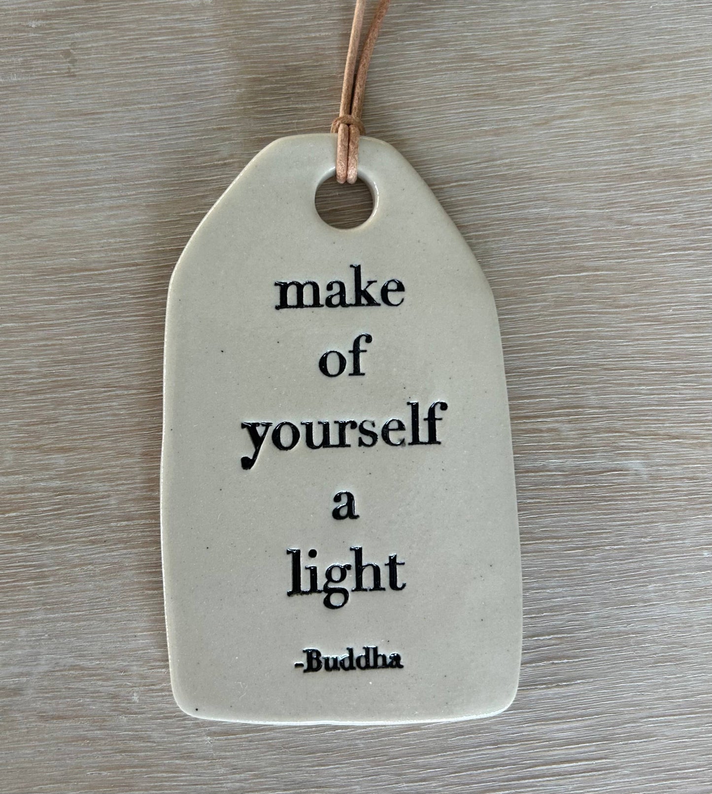 Ceramic Quote Tag: make of yourself a light