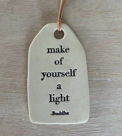 Ceramic Quote Tag: make of yourself a light
